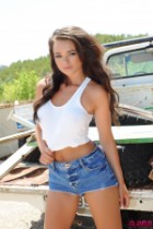 ThisIsGlamour   Janine Clarke In Her White Top And Denim Shorts By The Truc